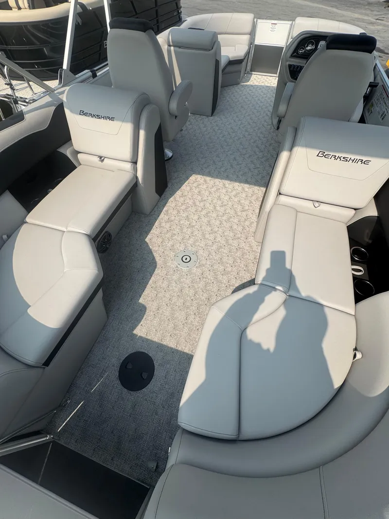 Slide: The Image of 2025 Berkshire 22RFX LE boat interior with spacious seating and modern design. - 11