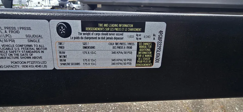 Slide: The Image of Tire and loading information label on a 2021 Crest Classic LX 220 SLC. - 19