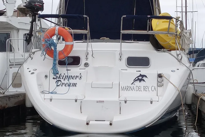 Slide: The Image of Hunter Passage 420 sailboat docked at Marina del Rey, California, named "Skipper's Dream." - 7