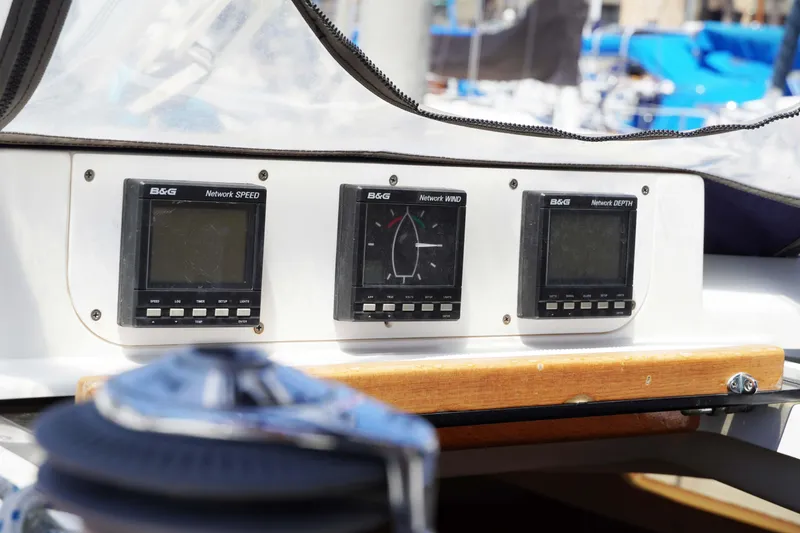 Slide: The Image of Control panel of a 2000 Hunter Passage 420 sailboat with navigation instruments. - 9