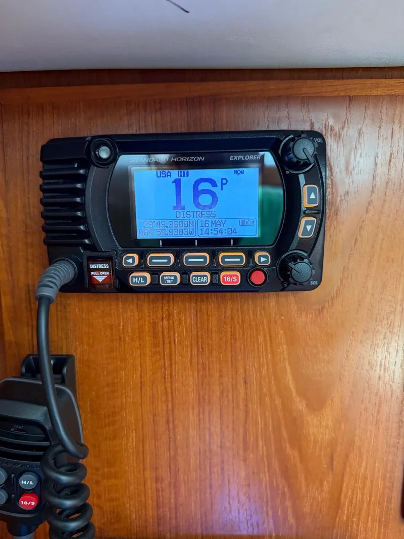 Slide: The Image of Marine radio on Jeanneau Sun Odyssey 36.2, 2000 model, mounted on wooden panel. - 18