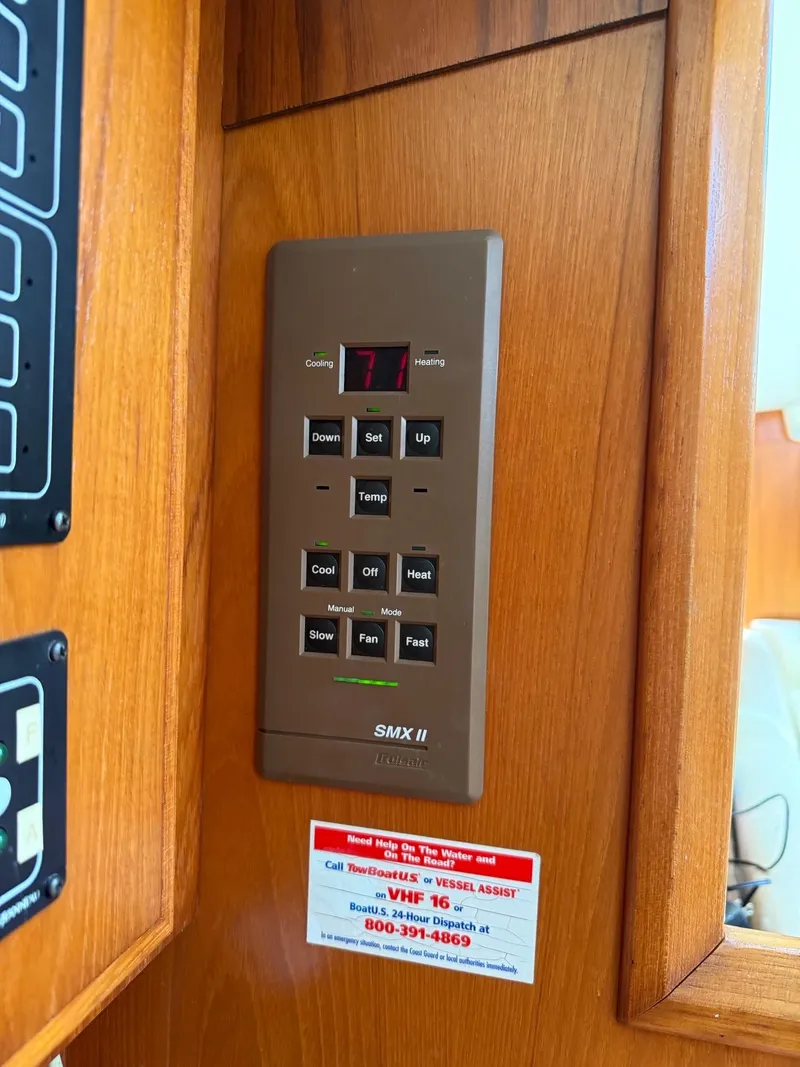 Slide: The Image of Control panel on a 2000 Jeanneau Sun Odyssey 36.2 sailboat interior. - 19