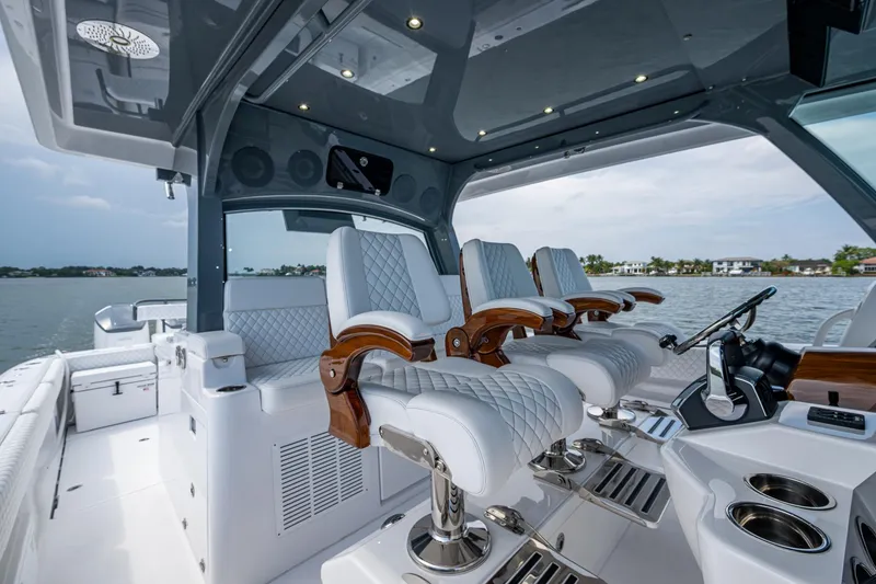 Slide: The Image of Luxurious interior of 2025 HCB 48 Campeon boat with plush seating and modern design. - 18