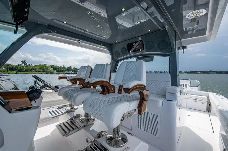 Slide: The Image of Luxurious interior of 2025 HCB 48 Campeon boat with plush seating and modern design. - 19