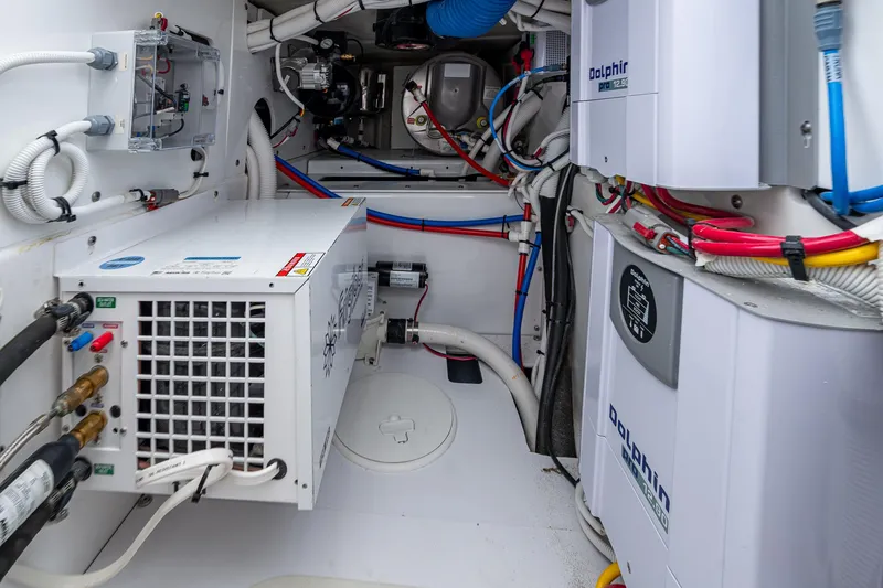 Slide: The Image of Engine room of 2025 HCB 48 Campeon with advanced electrical systems and wiring. - 29