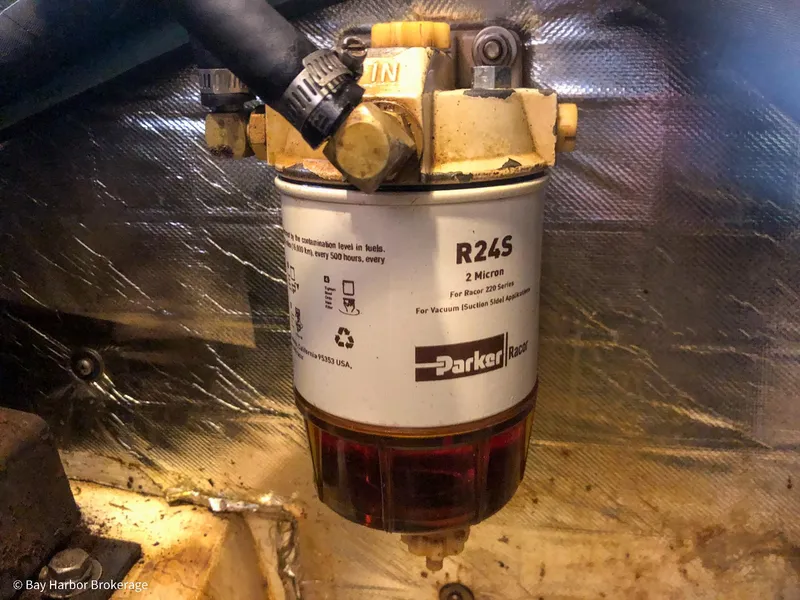 Slide: The Image of Fuel filter system in a 1992 Catalina 42 sailboat engine compartment. - 46