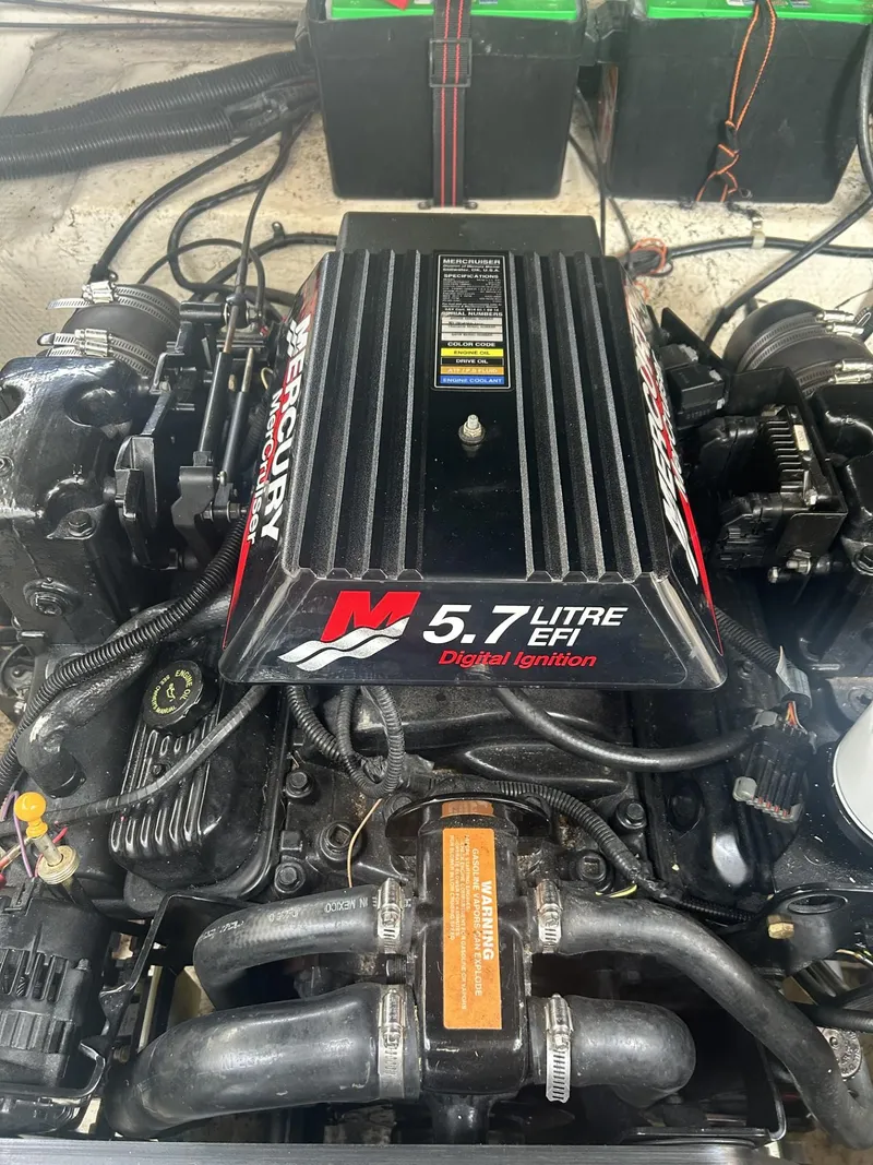 Slide: The Image of 5.7 Litre EFI engine in 2002 Rinker 342 Fiesta Vee boat. - 9