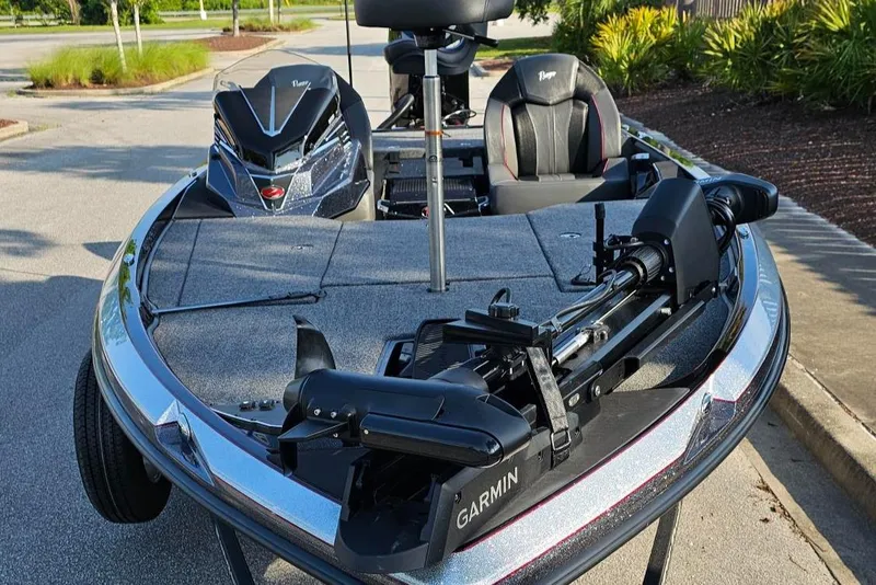 Slide: The Image of 2025 Ranger Z519R Cup-Equipped boat with Garmin trolling motor, parked on a sunny day. - 6