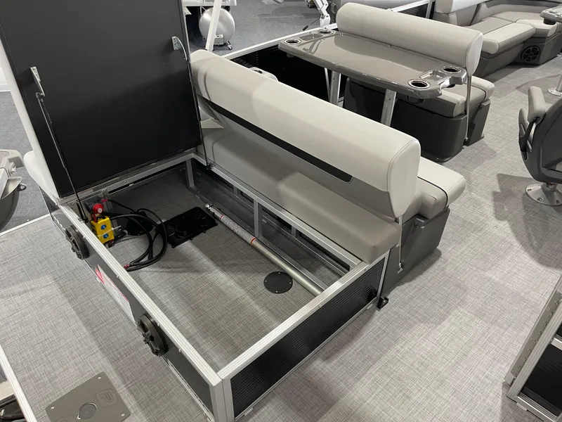 Slide: The Image of 2025 Princecraft Vectra 21 RL boat interior with open storage compartment and seating. - 10