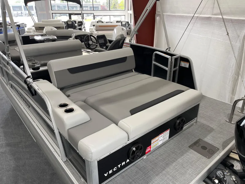 Slide: The Image of 2025 Princecraft Vectra 21 RL pontoon boat interior with gray seating and cup holders. - 8