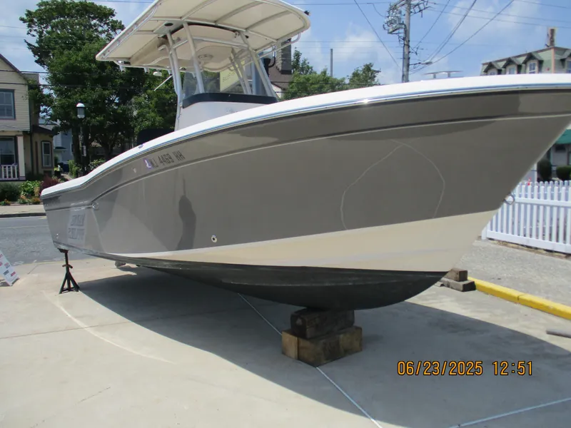 The Image of 2016 Grady-White Fisherman 230 boat on display, parked on a street. - 0