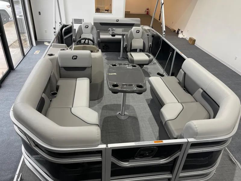 Slide: The Image of 2025 Princecraft Vectra 21 RL pontoon boat with spacious seating and modern interior design. - 13