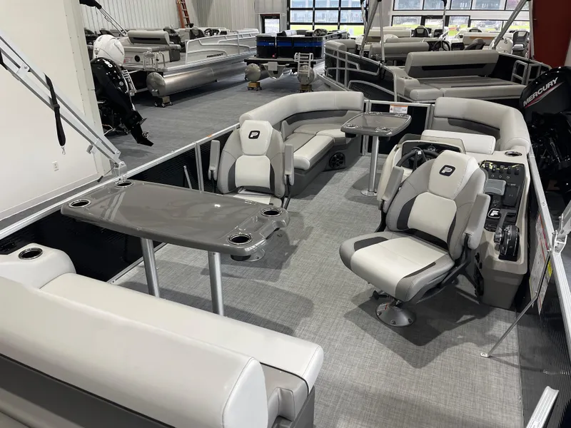 Slide: The Image of 2025 Princecraft Vectra 21 RL pontoon boat interior with modern seating and tables. - 8