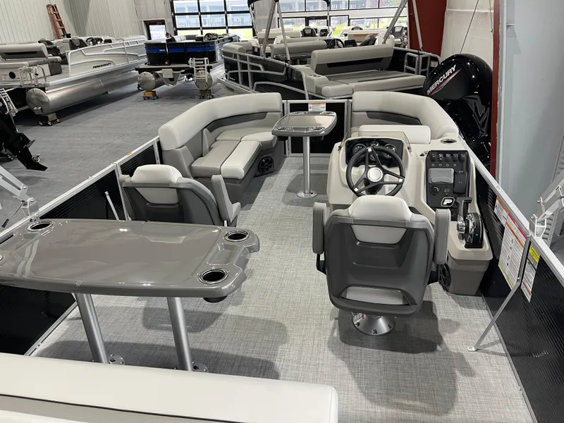 Slide: The Image of 2025 Princecraft Vectra 21 RL pontoon boat interior with seating and helm. - 9