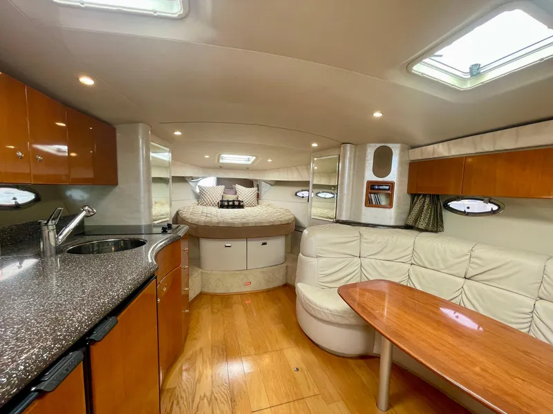 Slide: The Image of Luxurious interior of a 2003 Formula 40 PC yacht with modern amenities and elegant design. - 10