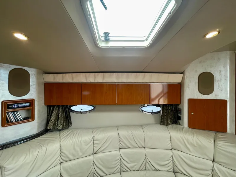 Slide: The Image of Interior of 2003 Formula 40 PC yacht with leather seating and wooden cabinets. - 13