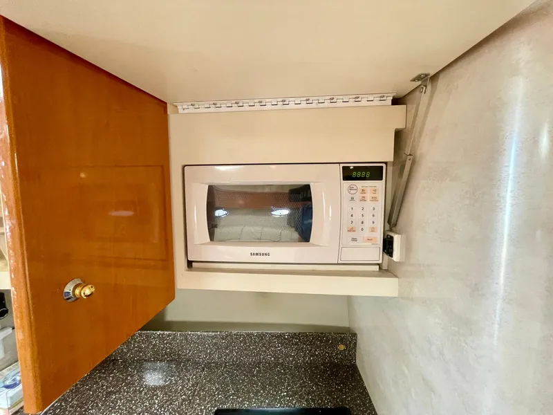 Slide: The Image of Built-in microwave in 2003 Formula 40 PC yacht kitchen cabinet. - 19