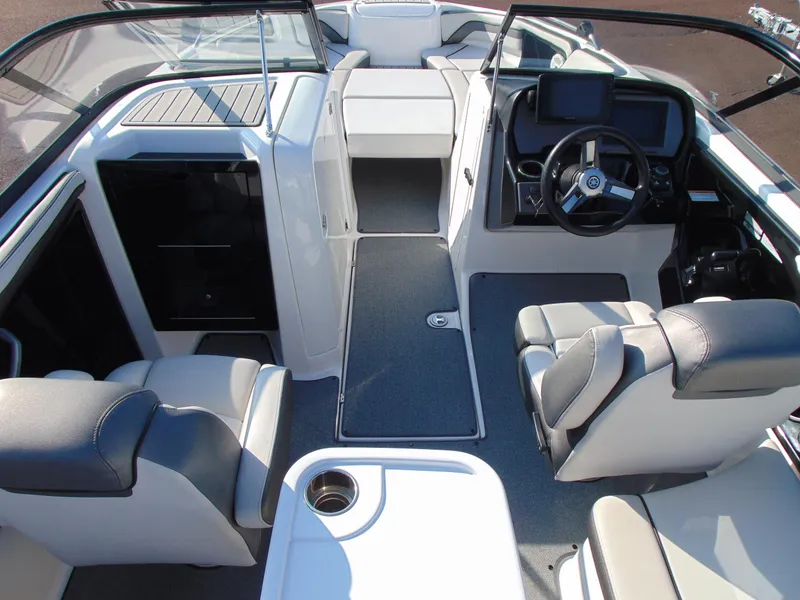 Slide: The Image of 2020 Yamaha Boats AR240 interior with modern dashboard and seating. - 6