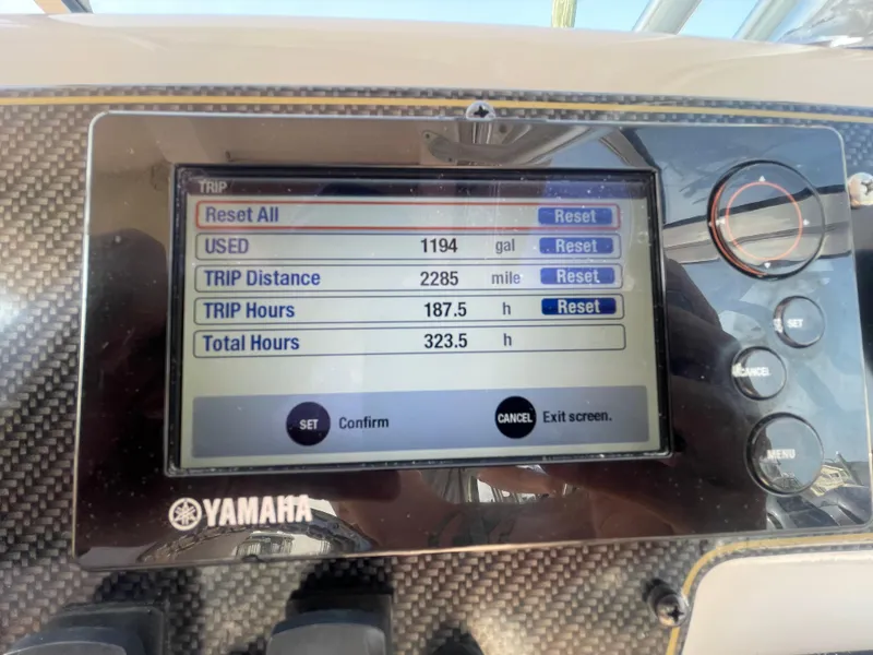 Slide: The Image of Yamaha boat dashboard showing trip data: 1194 gallons used, 2285 miles, 187.5 trip hours. - 20