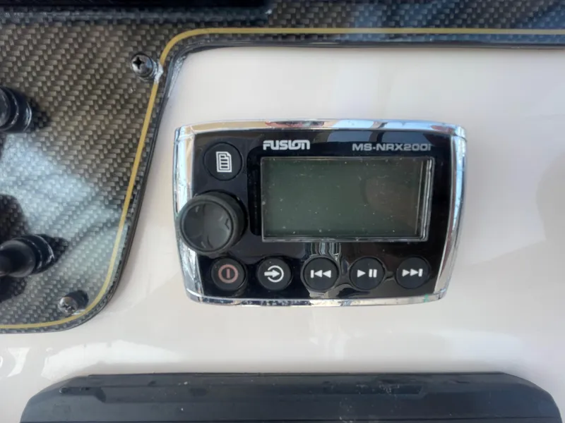 Slide: The Image of Fusion MS-NRX200i stereo on 2014 Grady-White Freedom 255 boat dashboard. - 27
