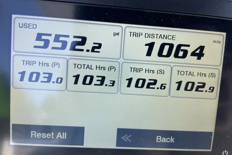 Slide: The Image of Display screen showing fuel usage and trip data for 2023 Robalo R270 Center Console. - 15
