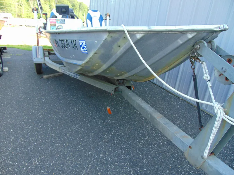 Slide: The Image of 1985 Fisher Hawk 3V boat on trailer. - 8