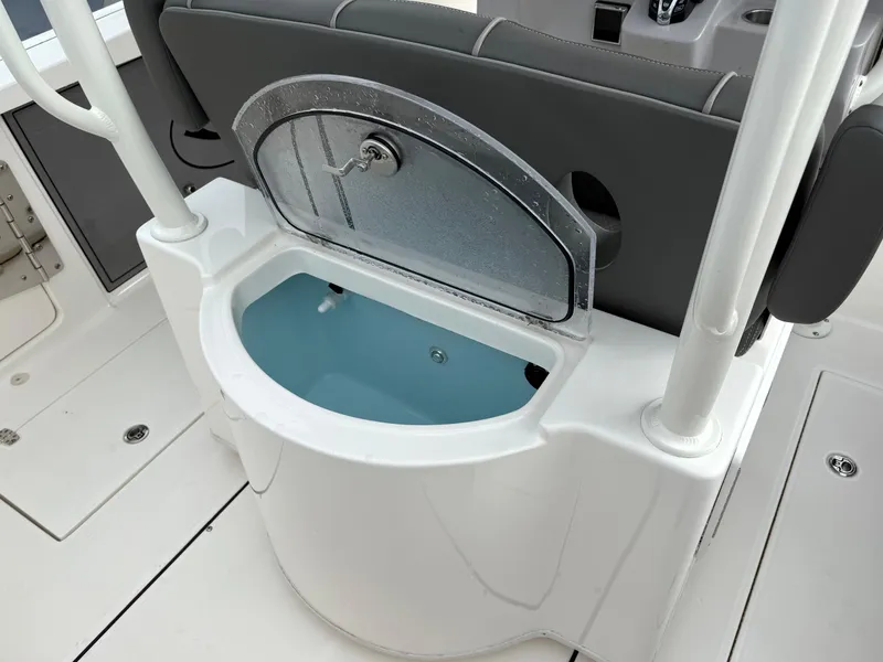 Slide: The Image of 2025 Sea Born SX281 boat with open storage compartment and seating area. - 20