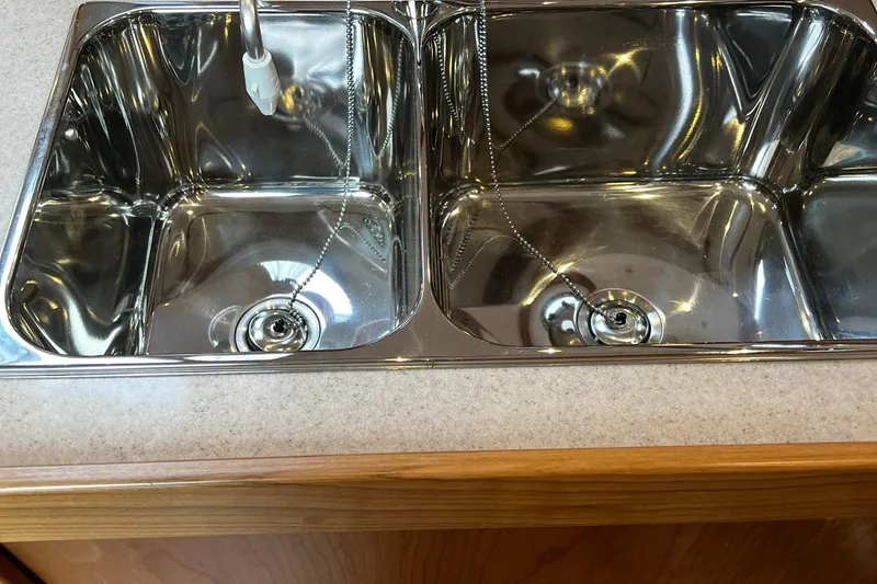 Slide: The Image of Stainless steel double sink on a Tartan 395 yacht, 2025 model. - 12