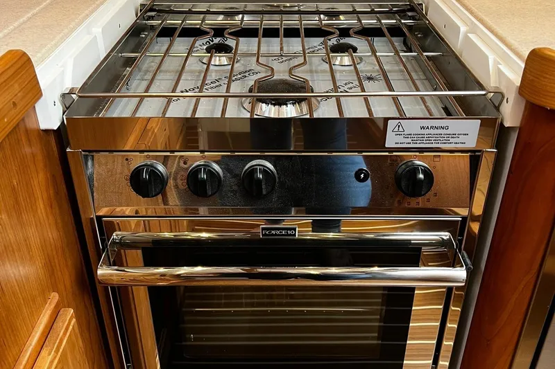 Slide: The Image of Modern Tartan 395 stove and oven, 2025 model, with sleek design and control knobs. - 13