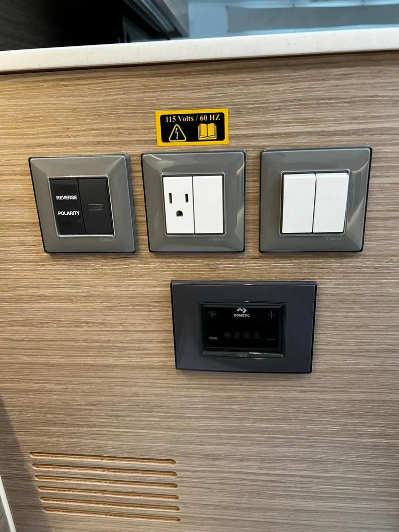 Slide: The Image of Control panel with switches and outlet on Tartan 395, 2025 model. - 29