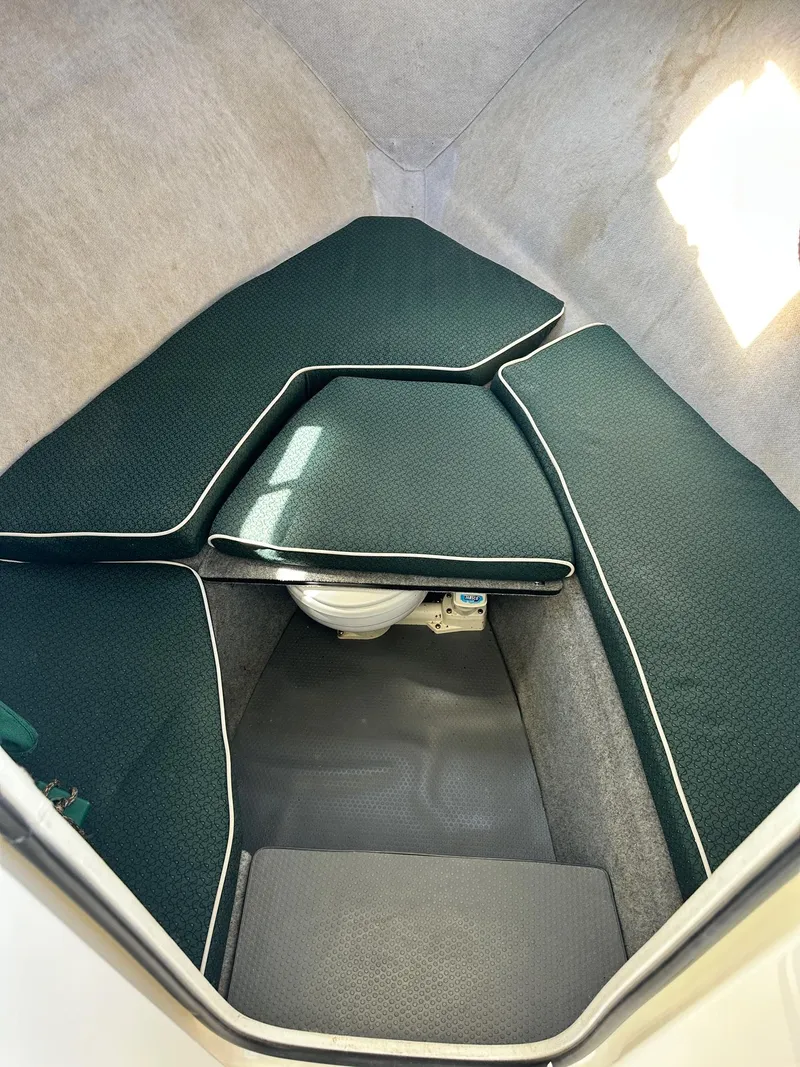 Slide: The Image of Ceiling view of a 2004 Trophy 2359 Hardtop boat with a skylight and light fixture. - 39