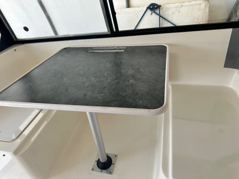 Slide: The Image of 2004 Trophy 2359 Hardtop boat named "Gusto" docked at Magothy River. - 8