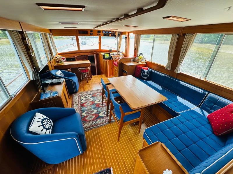 Slide: The Image of Interior of 1998 Grand Banks 49 Classic yacht with elegant seating and wooden finishes. - 18