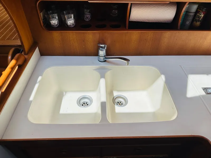 Slide: The Image of Double sink in 1998 Grand Banks 49 Classic yacht kitchen. - 41