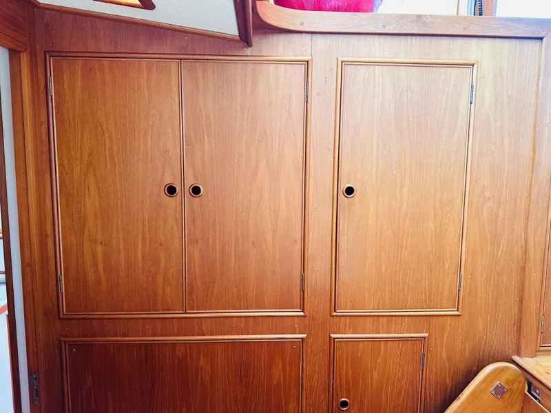 Slide: The Image of Wooden cabinetry on a 1998 Grand Banks 49 Classic yacht interior. - 45