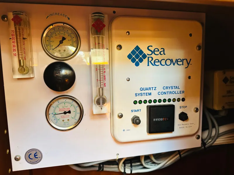 Slide: The Image of Sea Recovery system controls on a 1998 Grand Banks 49 Classic yacht. - 46