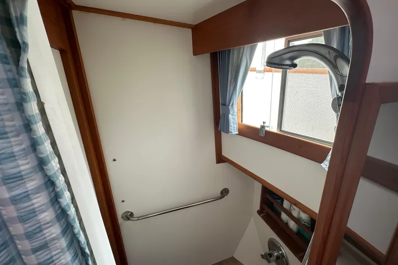 Slide: The Image of Bathroom interior of 1998 Grand Banks 49 Classic yacht with shower and window. - 57