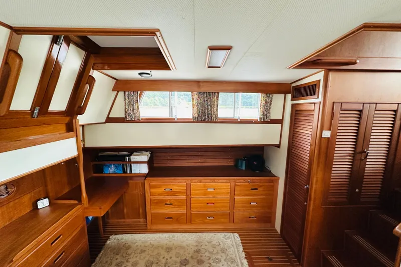Slide: The Image of Interior of 1998 Grand Banks 49 Classic yacht with wooden cabinetry and natural light. - 61