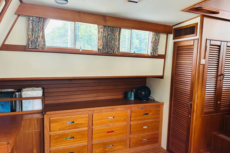 Slide: The Image of Interior of 1998 Grand Banks 49 Classic yacht with wooden cabinetry and windows. - 64
