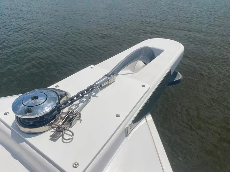 Slide: The Image of Bow of a 1970 Bertram 31 Bahia Mar with anchor chain and winch. - 20