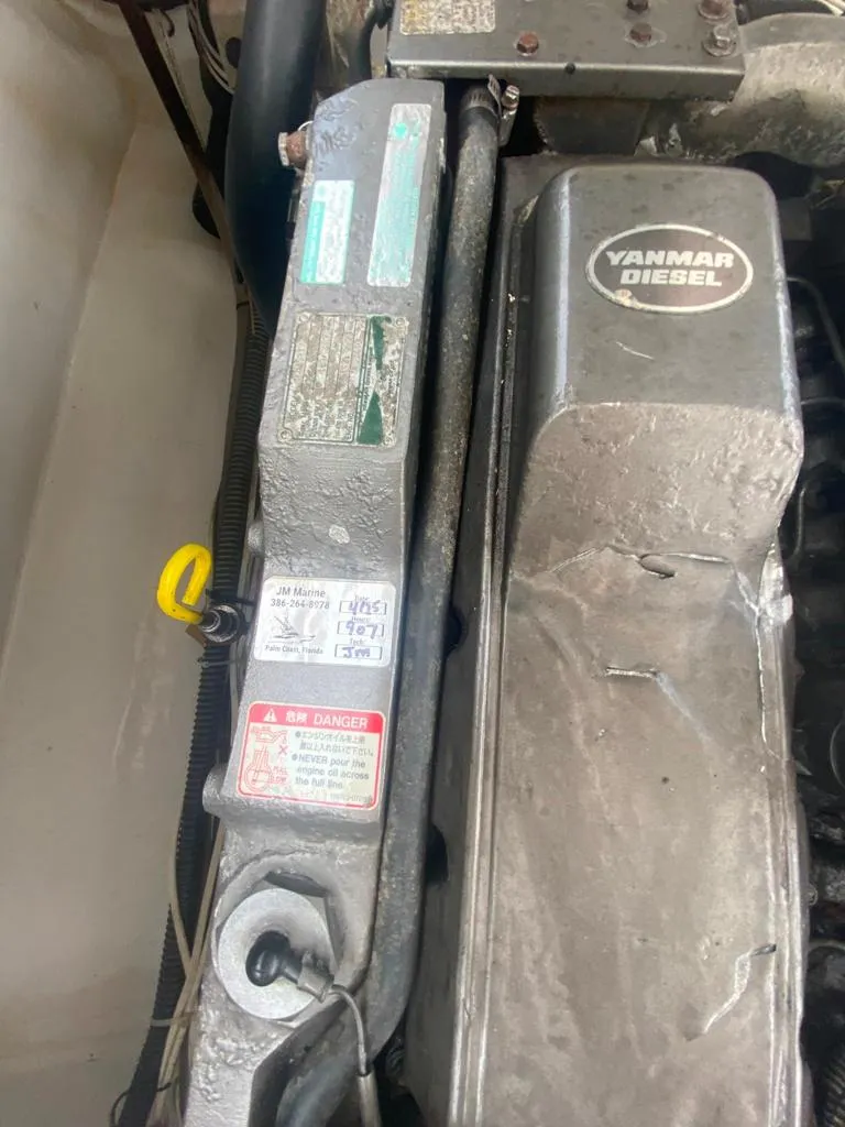 Slide: The Image of Engine compartment of a 1970 Bertram 31 Bahia Mar with Yanmar diesel engine. - 27