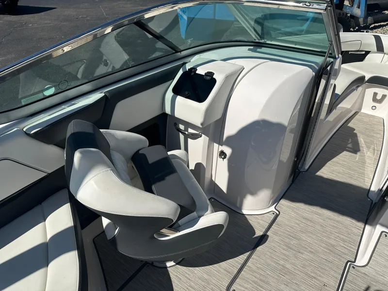 Slide: The Image of 2018 Regal 2500 Bowrider interior with sleek seating and modern dashboard design. - 5