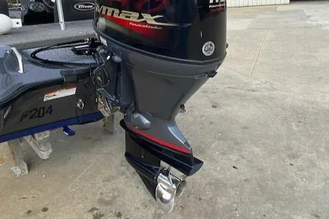 Slide: The Image of 2016 Triton 179 TrX boat with powerful outboard motor on concrete surface. - 14