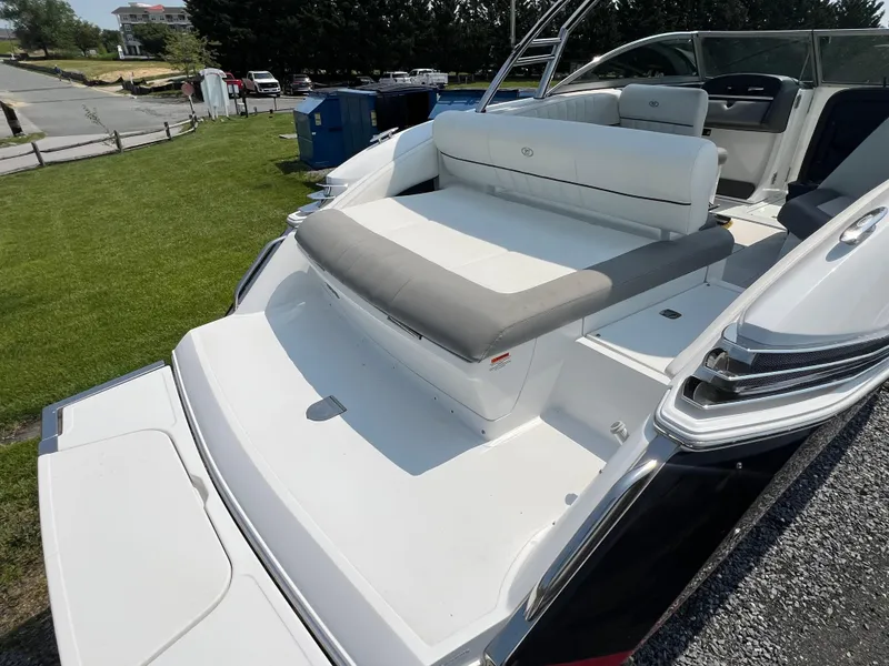 Slide: The Image of 2014 Cobalt 276 boat with spacious rear seating and sleek design. - 10
