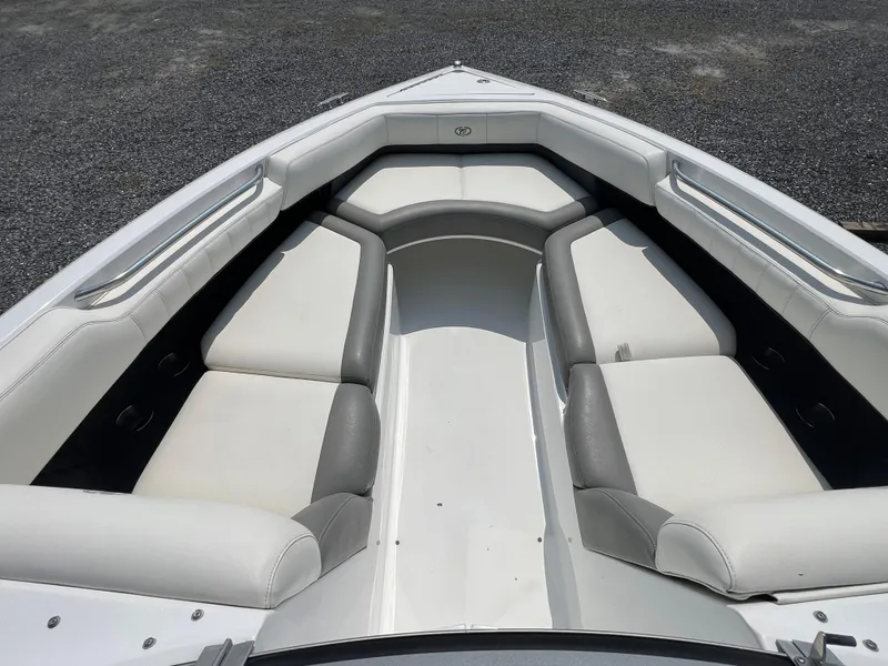Slide: The Image of 2014 Cobalt 276 boat interior with white and gray seating arrangement. - 5