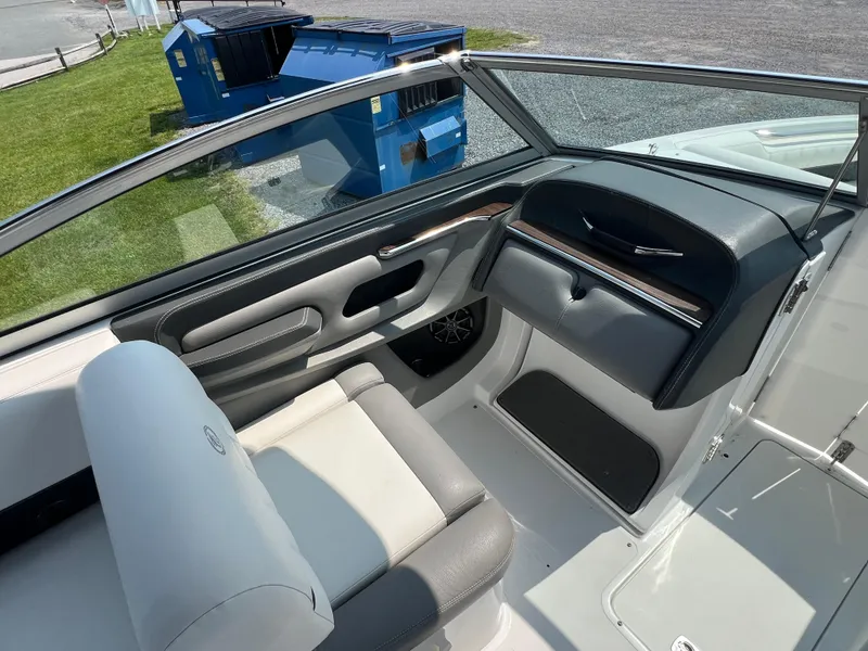 Slide: The Image of Interior of a 2014 Cobalt 276 boat with gray and white seating. - 6