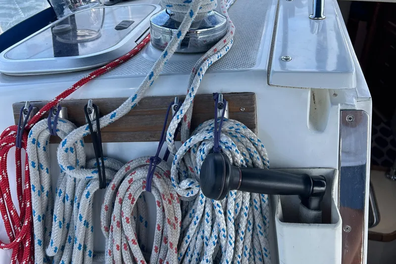 Slide: The Image of Ropes and winch handle on a 1998 Catalina 36MKII sailboat deck. - 17