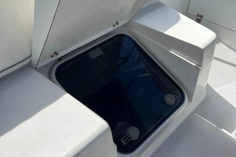 Slide: The Image of Access hatch on 1998 Catalina 36MKII sailboat deck, open and sunlit. - 19