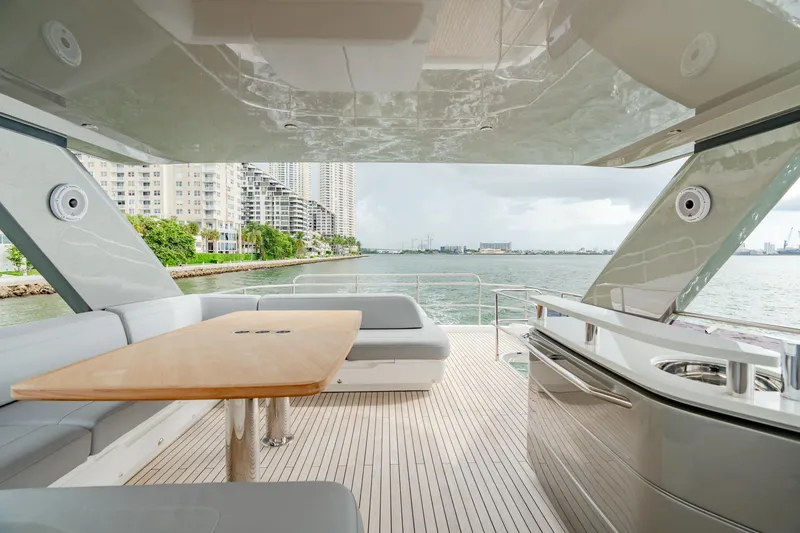 Slide: The Image of Luxurious 2019 Princess F70 yacht deck with seating, table, and ocean view. - 21