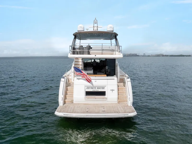 Slide: The Image of 2019 Princess F70 yacht on open water, rear view with American flag. - 3
